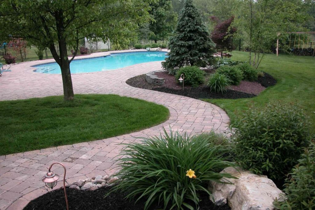 paver walkway to pool patio